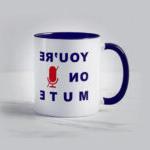 A mug with the words 'you're on mute'